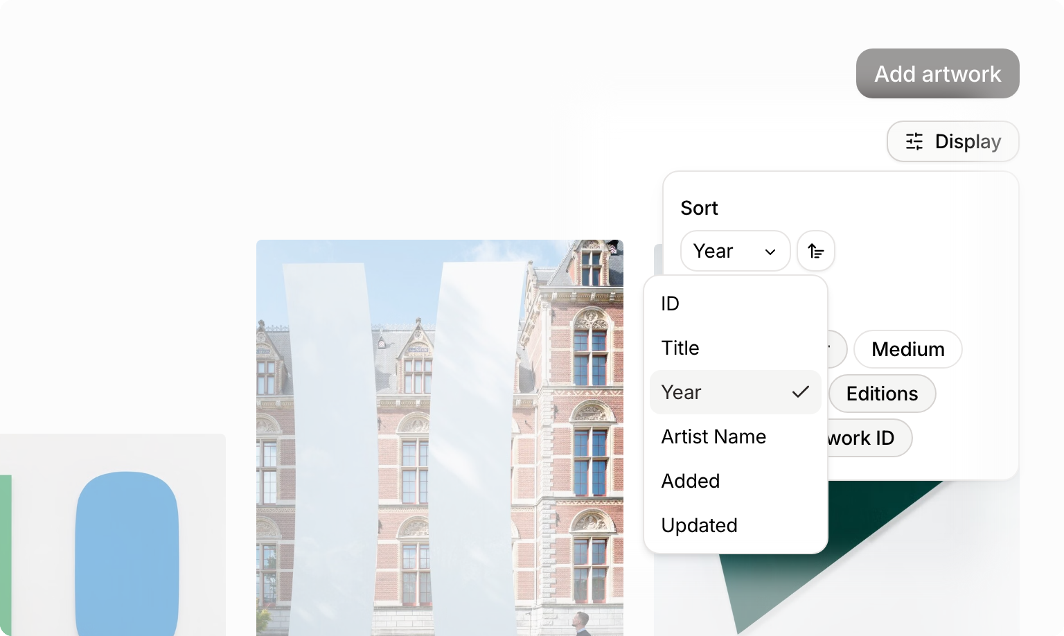 The Display menu on the Artworks page with its Sort dropdown open, listing ID, Title, Year, Artist name, Added, and Updated.